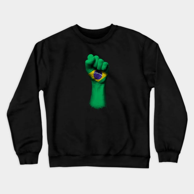 Flag of Brazil on a Raised Clenched Fist Crewneck Sweatshirt by jeffbartels